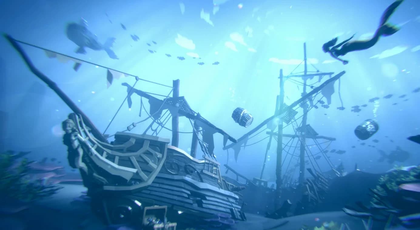 A sunken ship on the sea floor with a diver swimming above it